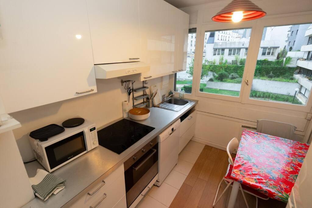 Appart Familiale - Bord De Quai Apartment ปารีส ภายนอก รูปภาพ